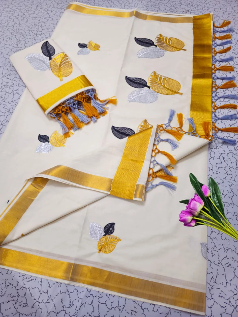 Off White Kasavu Cotton Saree with Gold, Silver & Black Leaf Motif Embroidery